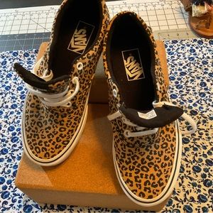 Leopard print Vans.